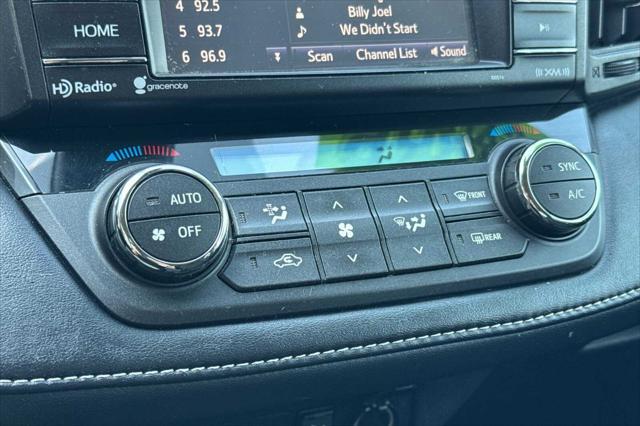 used 2018 Toyota RAV4 car, priced at $13,000