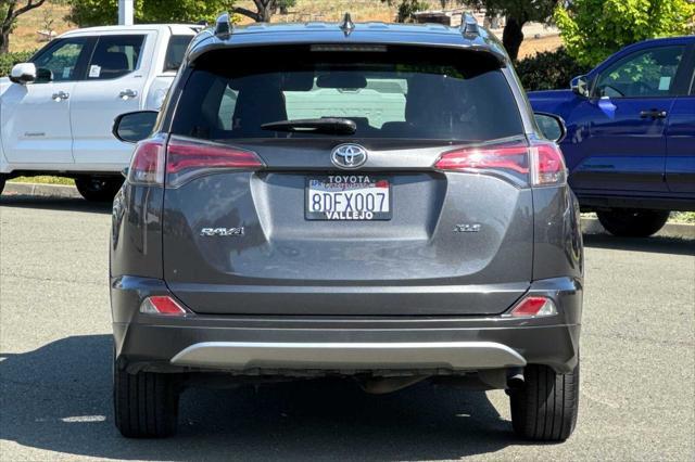 used 2018 Toyota RAV4 car, priced at $13,000