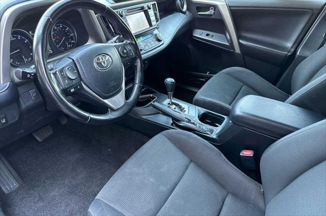 used 2018 Toyota RAV4 car, priced at $13,000