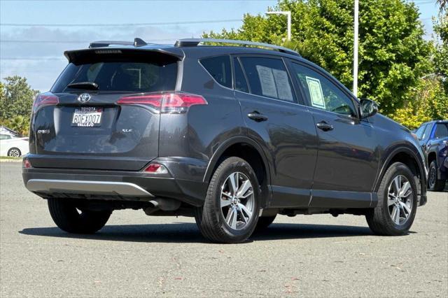 used 2018 Toyota RAV4 car, priced at $13,000