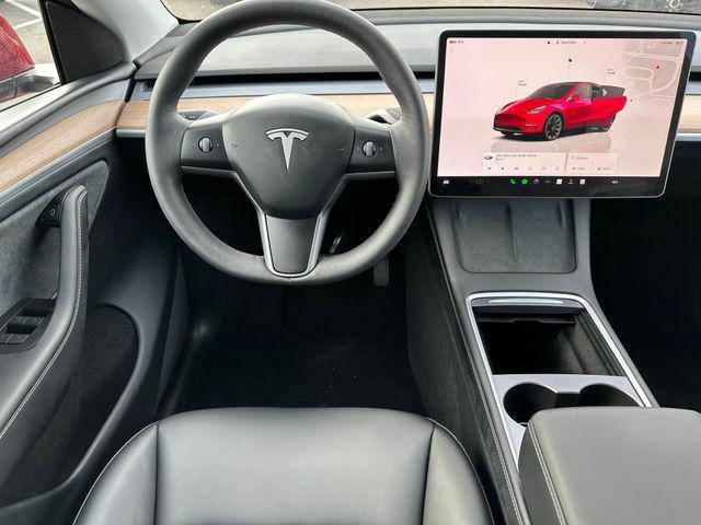 used 2024 Tesla Model Y car, priced at $39,939