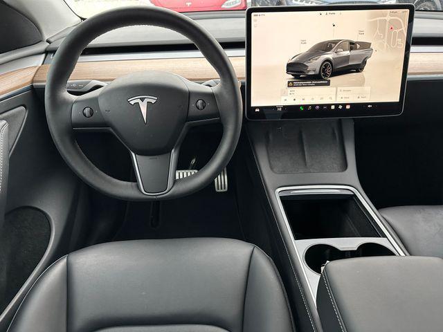 used 2023 Tesla Model Y car, priced at $35,935