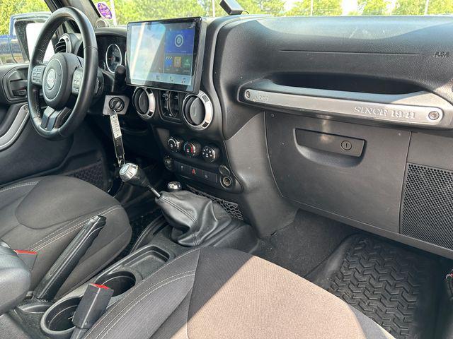 used 2013 Jeep Wrangler Unlimited car, priced at $16,997