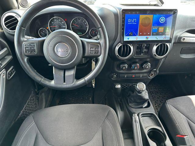 used 2013 Jeep Wrangler Unlimited car, priced at $16,997