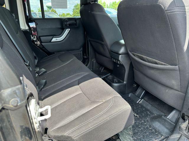 used 2013 Jeep Wrangler Unlimited car, priced at $16,997