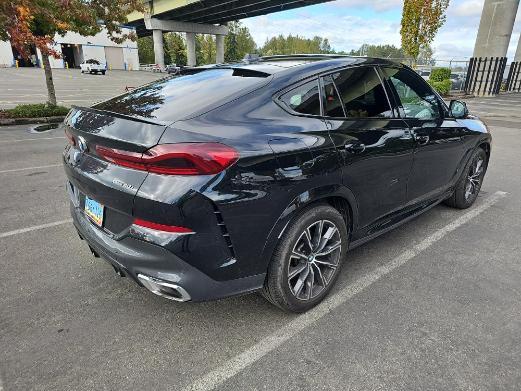 used 2024 BMW X6 car, priced at $57,777