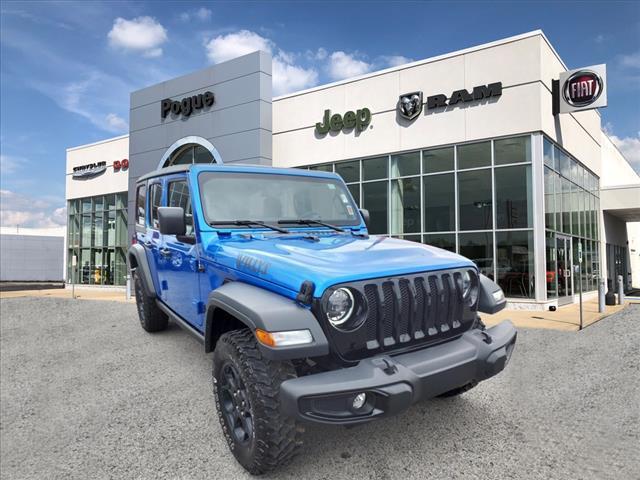 used 2023 Jeep Wrangler car, priced at $34,932