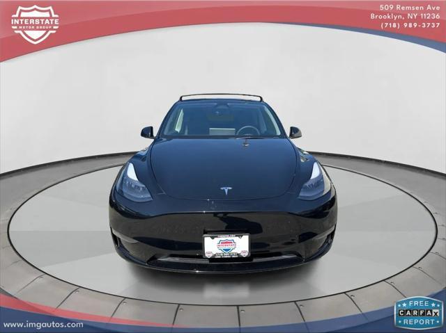 used 2023 Tesla Model Y car, priced at $32,899