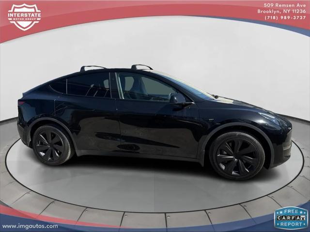 used 2023 Tesla Model Y car, priced at $32,899