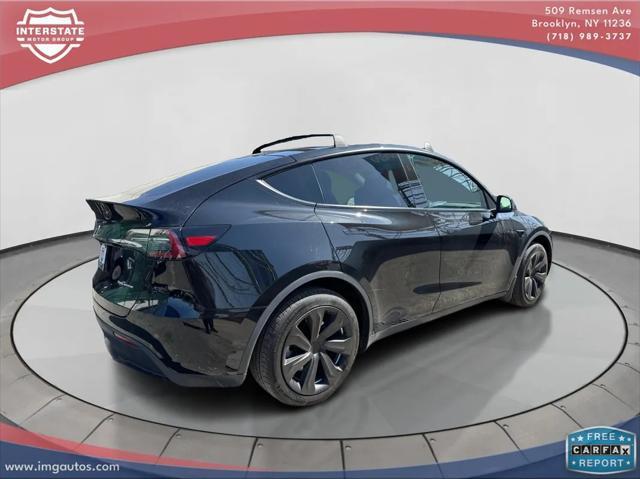 used 2023 Tesla Model Y car, priced at $32,899