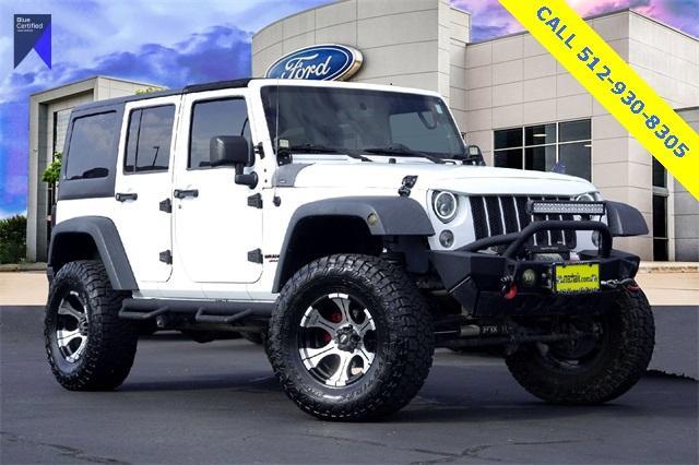 used 2016 Jeep Wrangler Unlimited car, priced at $21,489