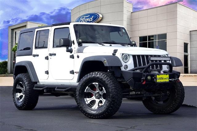 used 2016 Jeep Wrangler Unlimited car, priced at $21,489