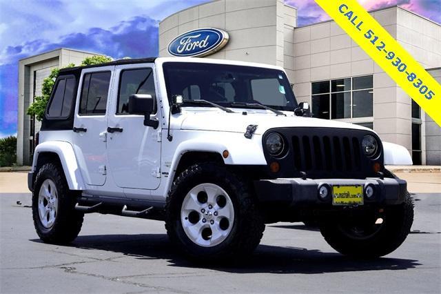 used 2013 Jeep Wrangler Unlimited car, priced at $18,419