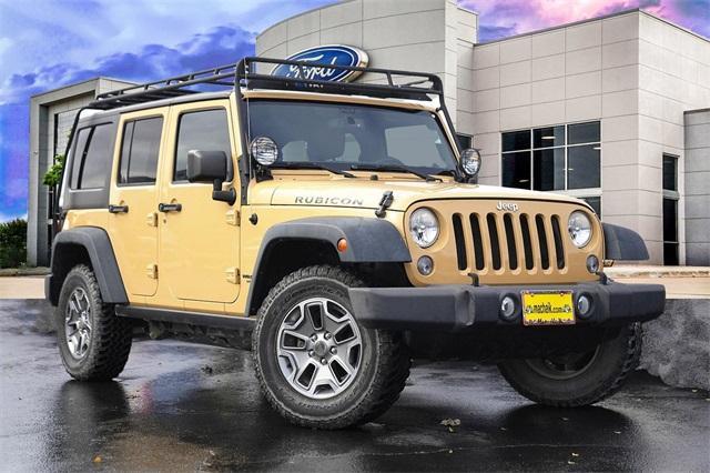 used 2014 Jeep Wrangler Unlimited car, priced at $22,619