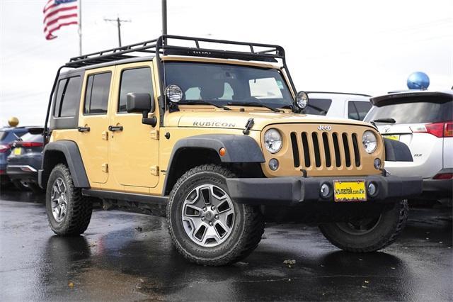 used 2014 Jeep Wrangler Unlimited car, priced at $22,619