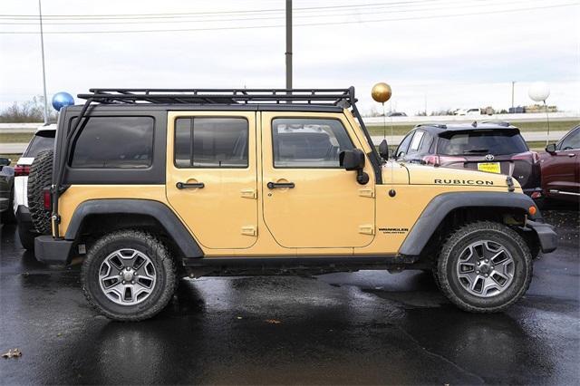 used 2014 Jeep Wrangler Unlimited car, priced at $22,619