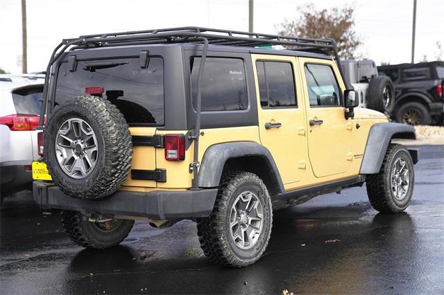 used 2014 Jeep Wrangler Unlimited car, priced at $22,619