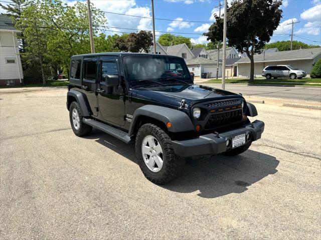 used 2013 Jeep Wrangler Unlimited car, priced at $15,995