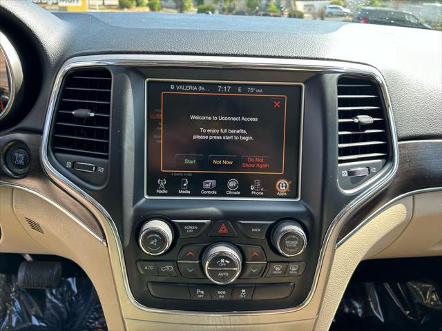 used 2014 Jeep Grand Cherokee car, priced at $14,995