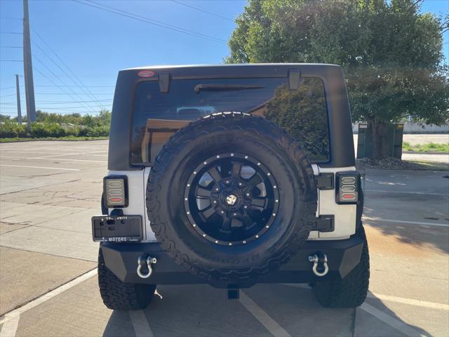 used 2014 Jeep Wrangler car, priced at $13,995