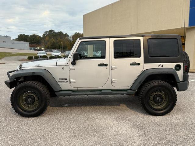 used 2011 Jeep Wrangler Unlimited car, priced at $16,995