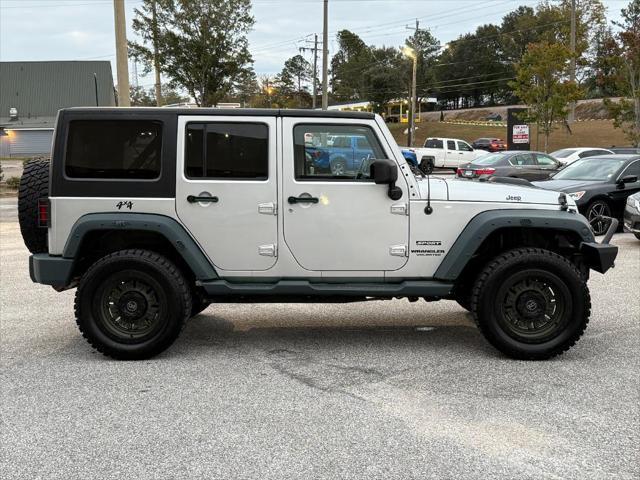 used 2011 Jeep Wrangler Unlimited car, priced at $16,995