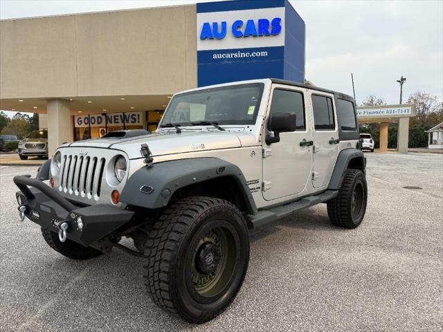 used 2011 Jeep Wrangler Unlimited car, priced at $16,995