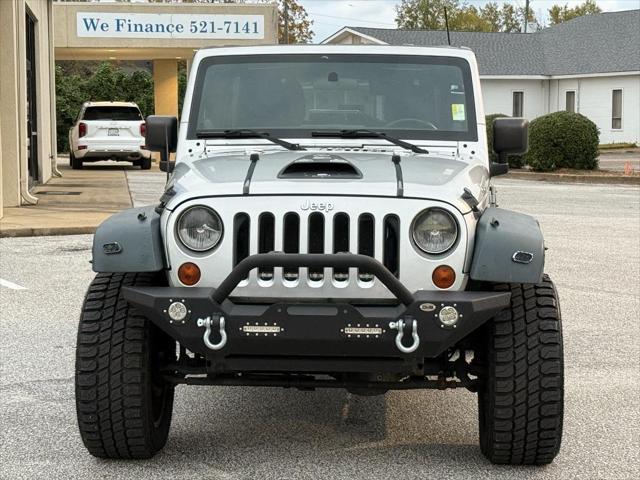 used 2011 Jeep Wrangler Unlimited car, priced at $16,995