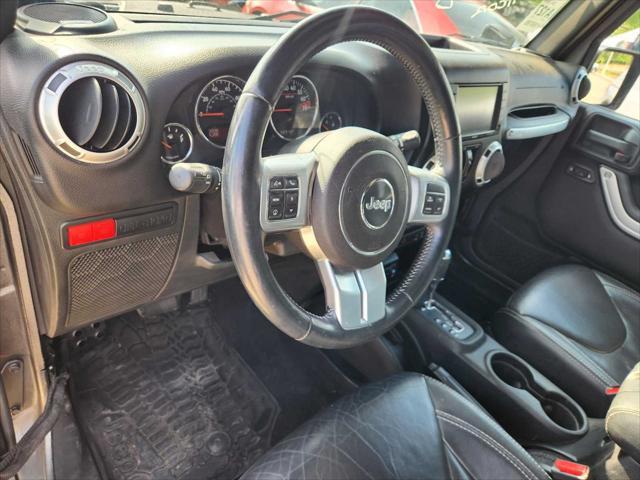 used 2015 Jeep Wrangler Unlimited car, priced at $25,235