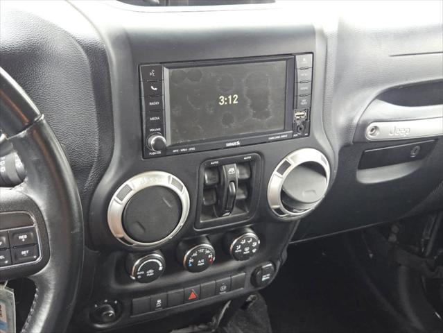 used 2011 Jeep Wrangler Unlimited car, priced at $12,500