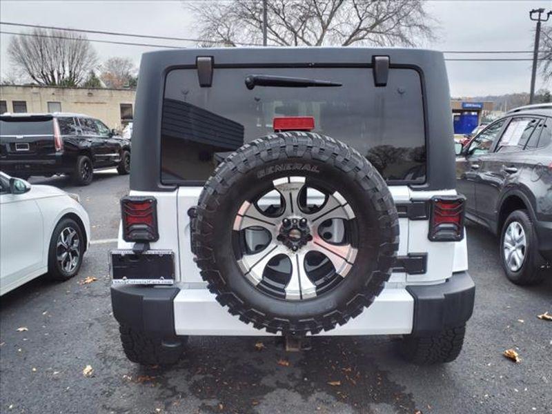 used 2016 Jeep Wrangler Unlimited car, priced at $22,955