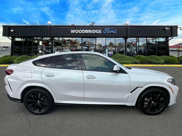 used 2022 BMW X6 car, priced at $57,998