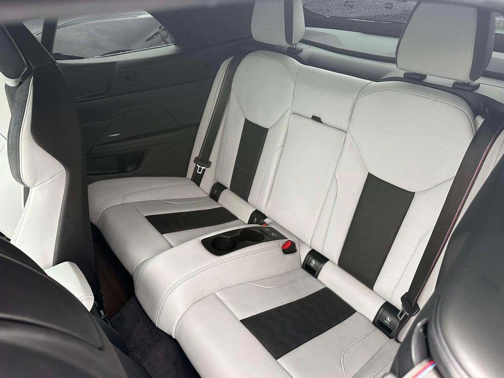 used 2023 BMW M4 car, priced at $62,998