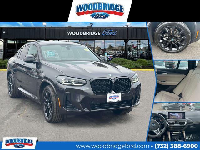 used 2022 BMW X4 car, priced at $35,998