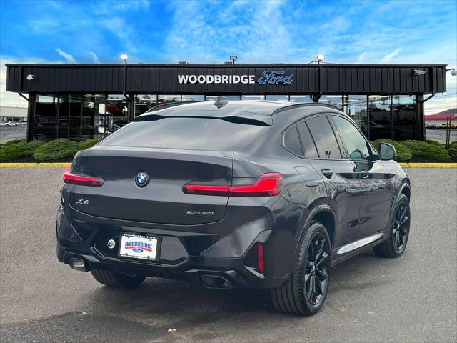 used 2022 BMW X4 car, priced at $35,998