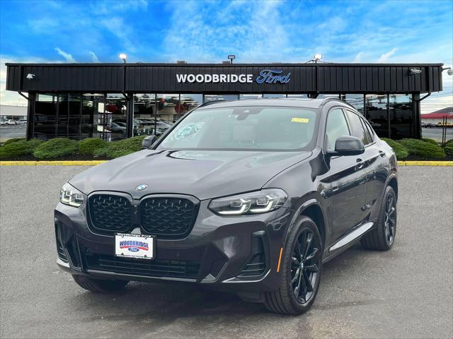 used 2022 BMW X4 car, priced at $35,998