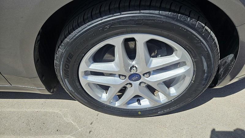 used 2014 Ford Fusion car, priced at $7,999