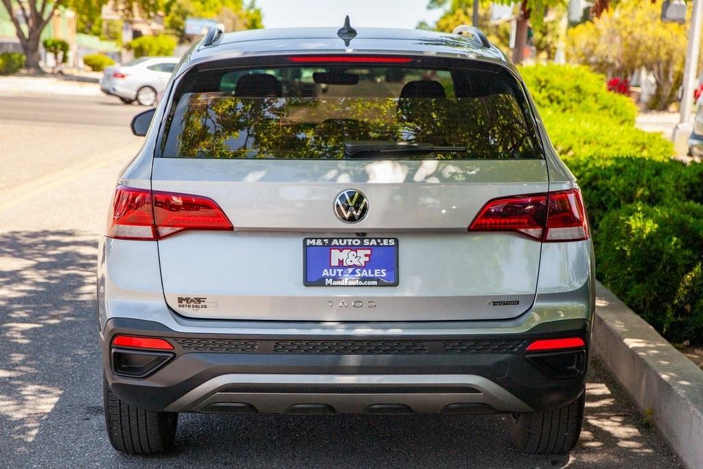 used 2024 Volkswagen Taos car, priced at $23,499