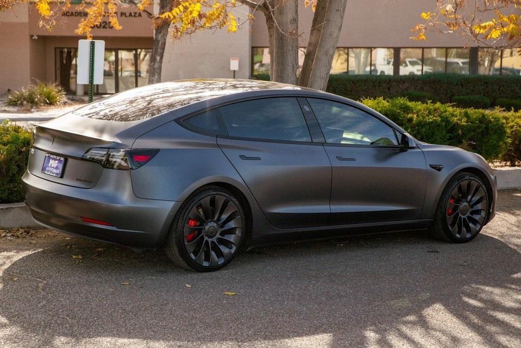 used 2021 Tesla Model 3 car, priced at $25,950