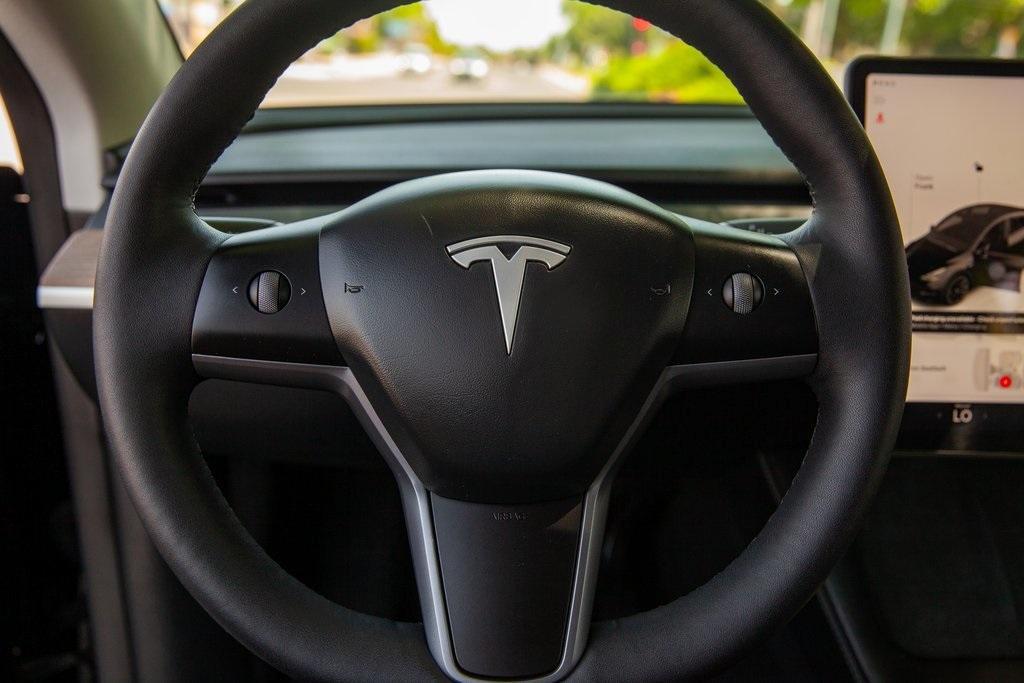 used 2024 Tesla Model Y car, priced at $36,950