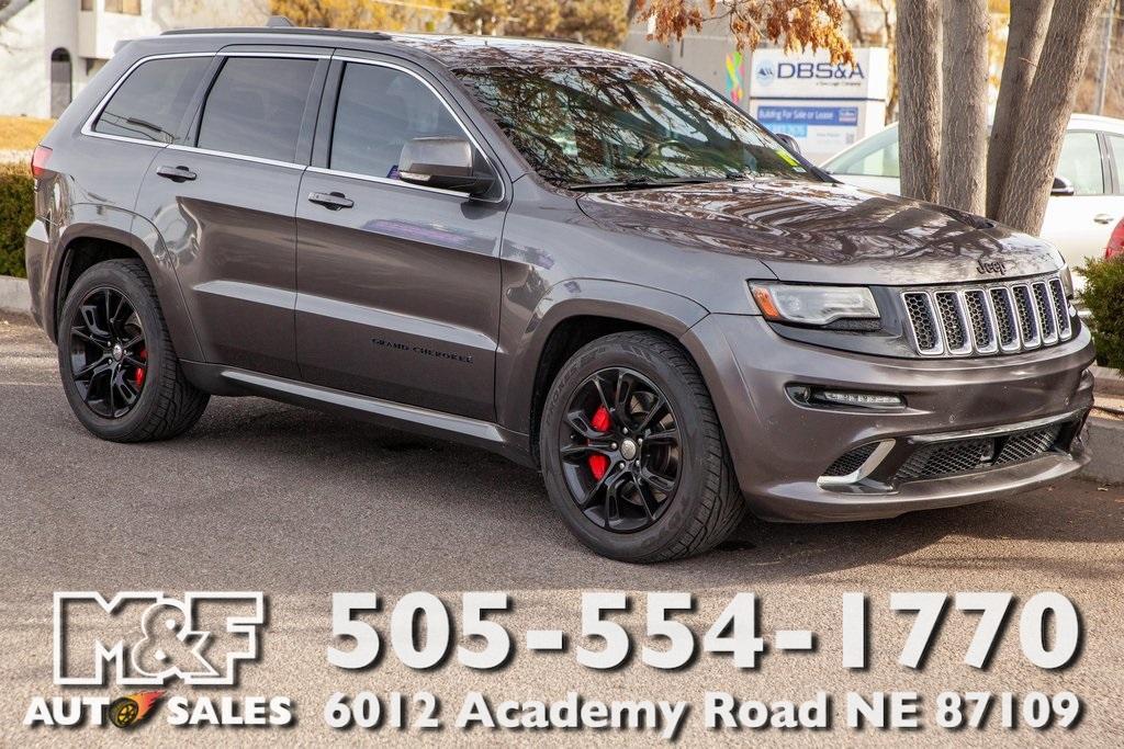 used 2014 Jeep Grand Cherokee car, priced at $33,950