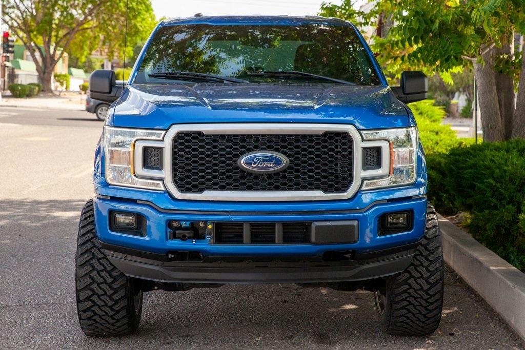 used 2018 Ford F-150 car, priced at $26,950