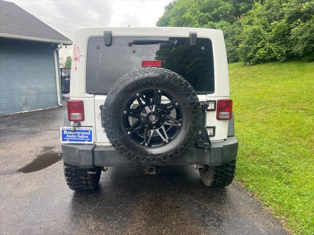 used 2013 Jeep Wrangler Unlimited car, priced at $16,995