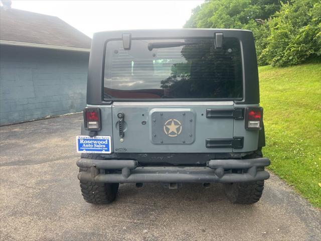 used 2015 Jeep Wrangler car, priced at $15,995