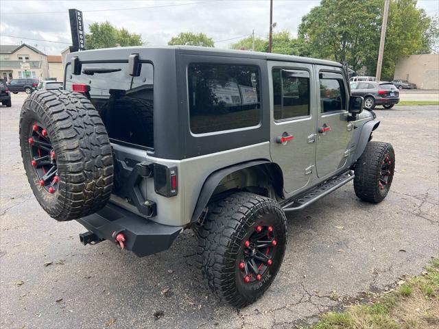 used 2013 Jeep Wrangler Unlimited car, priced at $18,995