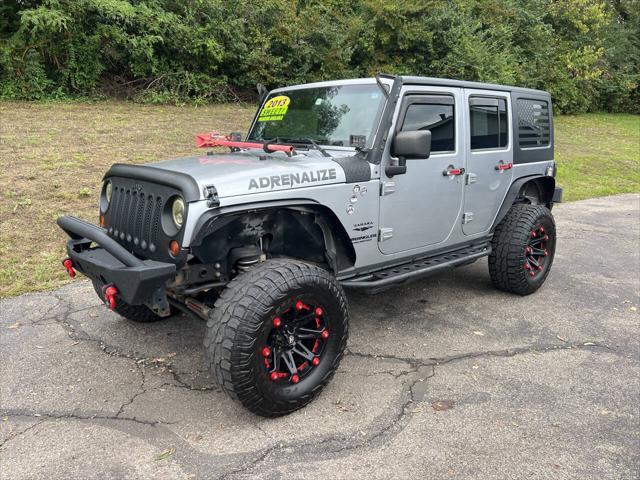 used 2013 Jeep Wrangler Unlimited car, priced at $18,995