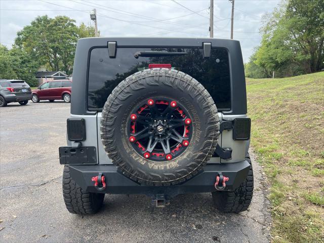 used 2013 Jeep Wrangler Unlimited car, priced at $18,995