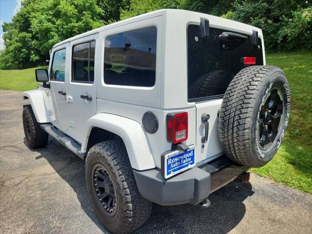 used 2014 Jeep Wrangler Unlimited car, priced at $19,995