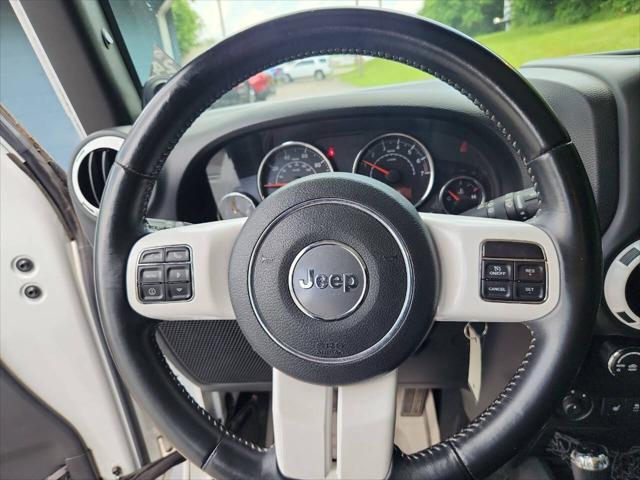 used 2014 Jeep Wrangler Unlimited car, priced at $19,995