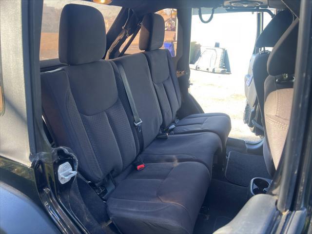 used 2013 Jeep Wrangler Unlimited car, priced at $15,995